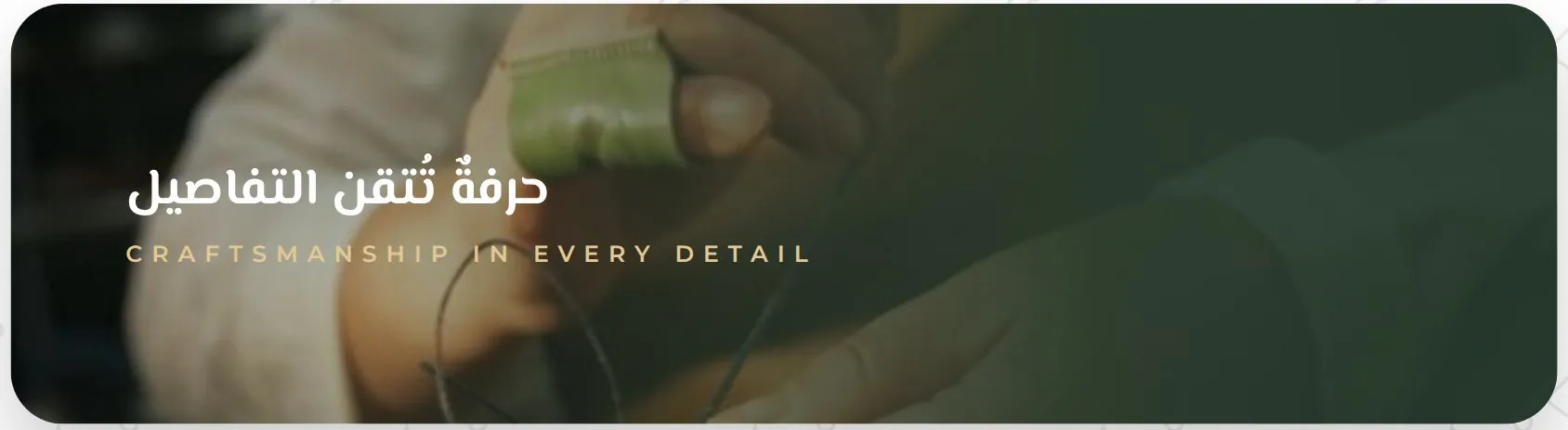 An artisan hand-stitching a green leather piece with needle and thread